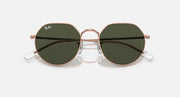 Round sunglasses with rose gold frame and dark green tinted lenses, front view