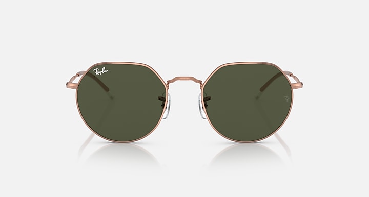Round sunglasses with rose gold frame and dark olive tinted lenses, front view