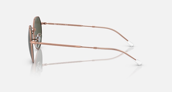 Round sunglasses side view with rose gold frame and brown temple arms