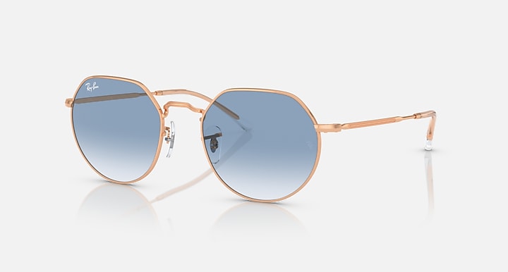 Ray-Ban round sunglasses with rose gold frame and light blue gradient lenses