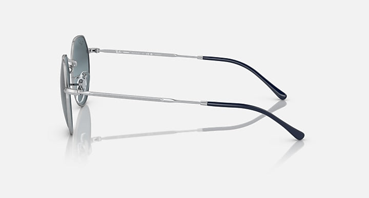 Round sunglasses side view with silver frame and dark blue temple arms