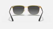 Rectangular sunglasses with gold-tone frame, dark lenses, black arms