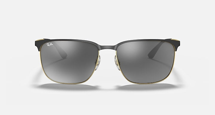 Square sunglasses with dark grey lenses, black frame and gold-tone bridge detail
