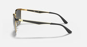 Metal sunglasses side view with dark lenses, black arms and gold-tone frame
