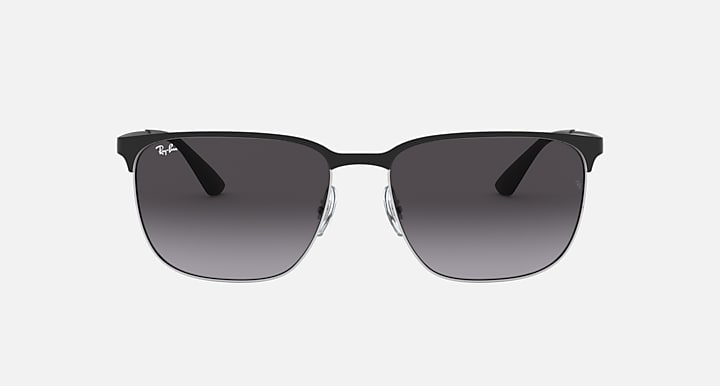 Sunglasses with dark gray lenses and black frame; front view with bridge detail