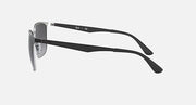 Sunglasses with dark gray lenses and black frame, side profile with curved temples