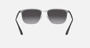 Sunglasses with dark gray gradient lenses and silver metal frame; front view