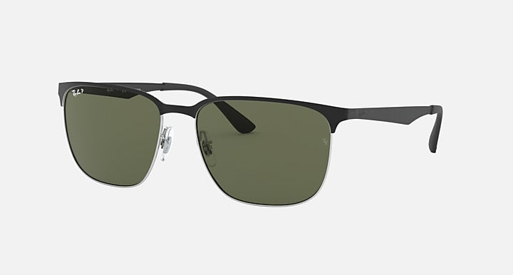 Rectangular-square sunglasses with dark green gradient lenses and black frame arms