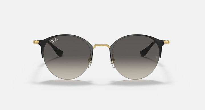 RB3578 sunglasses with black round frames and gold bridge, dark grey tinted lenses.