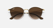 RB3578 sunglasses with brown gradient lenses and gold rims, front view.