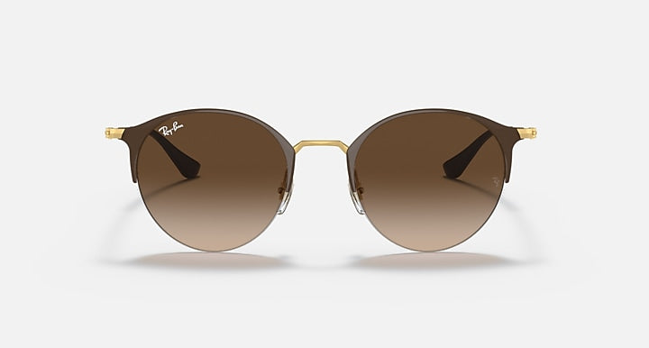 RB3578 sunglasses with brown-tinted round lenses and gold bridge detail.