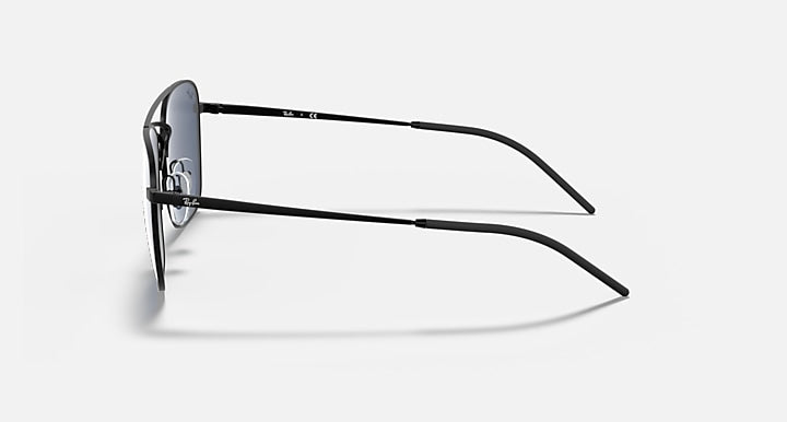 Side-profile sunglasses with dark blue lens and black slim metal arms