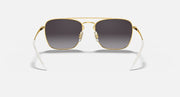 Square sunglasses with gold frame and dark lenses