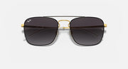 Square sunglasses with dark lenses, gold bridge, and black outer frames