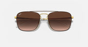 Square sunglasses with dark lenses and black frame with gold details