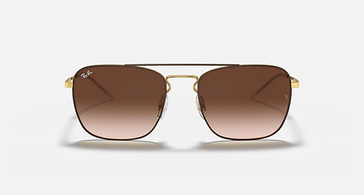 Square sunglasses with gold frame and brown gradient lenses