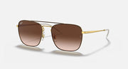 Square sunglasses with gold frame and brown gradient lenses
