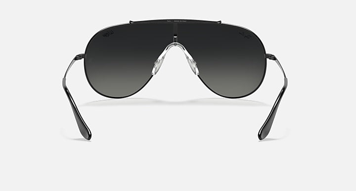 Aviator-style sunglasses with black frames and dark smoke lenses, front view