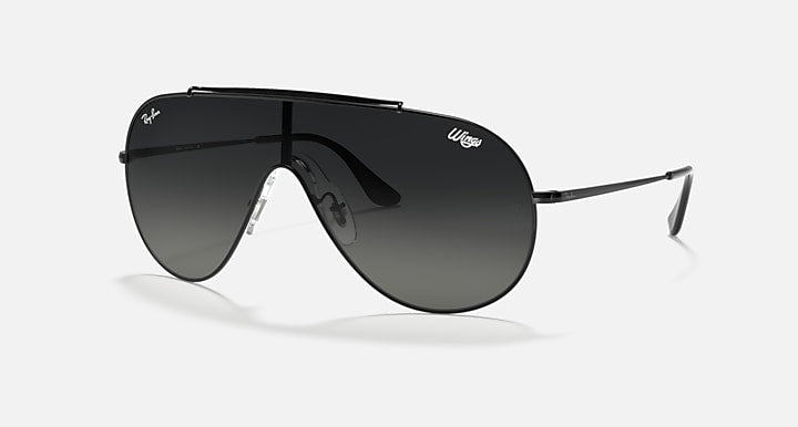 Ray-Ban aviator-style sunglasses with black frames and dark smoke lenses