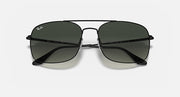 Sunglasses with dark green mirrored lenses and black metal frame, front angle