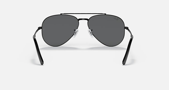 Aviator sunglasses with black frame and dark gray lenses, front view.