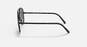 Aviator sunglasses with black metal frame and dark lenses, side profile.