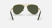 Gold-tone aviator sunglasses with dark green lenses and rounded aviator shape