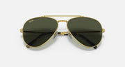 Gold-tone aviator sunglasses with dark green lenses; front view with metal bridge