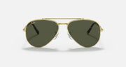 Gold-tone aviator sunglasses with dark green lenses and signature cutout bridge