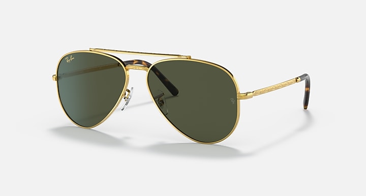 Gold-tone aviator sunglasses with green lenses and slim metal arms