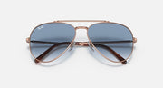 Rose gold aviator sunglasses with blue gradient lenses, front view with bridge detail