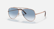 Rose gold aviator sunglasses with blue gradient lenses and slim metal temples