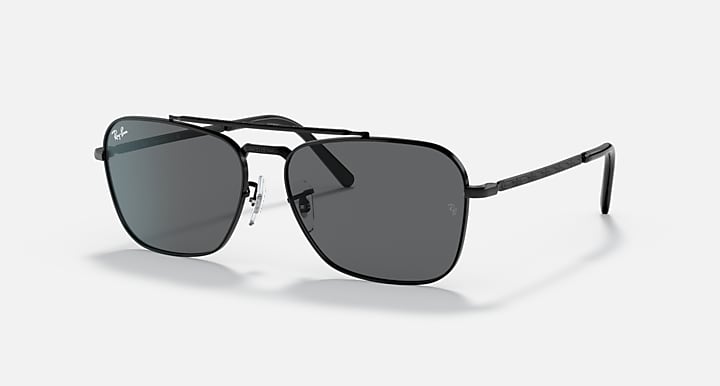 Black rectangular sunglasses with dark grey gradient lenses and thin metal arms