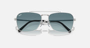 Ray-Ban Caravan sunglasses angled view with silver frame and dark teal mirrored lenses