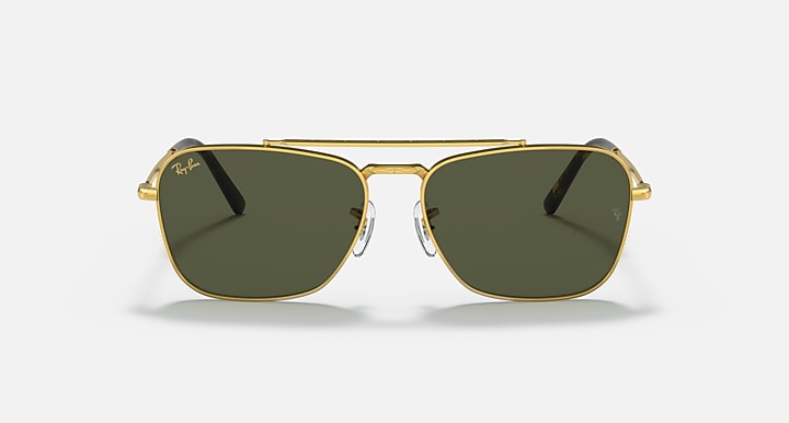 Gold full-rim sunglasses with dark green lenses and slim temple arms