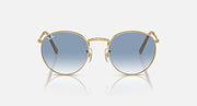 Gold-tone round sunglasses with blue gradient lenses, featuring small top hinge details
