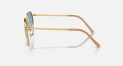 Gold-tone round sunglasses side view with clear bridge and dark brown temple tips