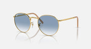 Gold-tone round sunglasses with blue-to-gray gradient lenses and slim metal temples