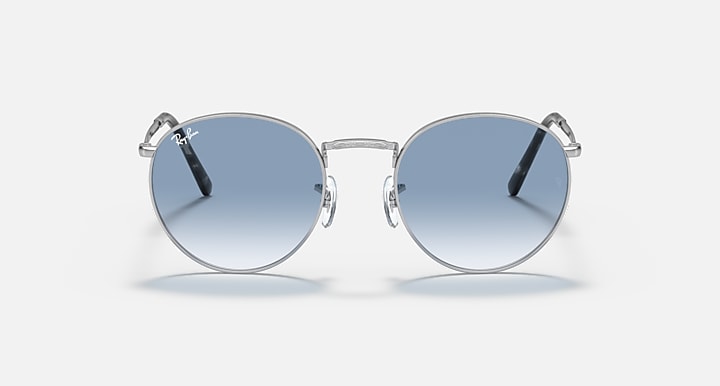 Ray-Ban round sunglasses shown from the top view with blue gradient lenses and dark temples