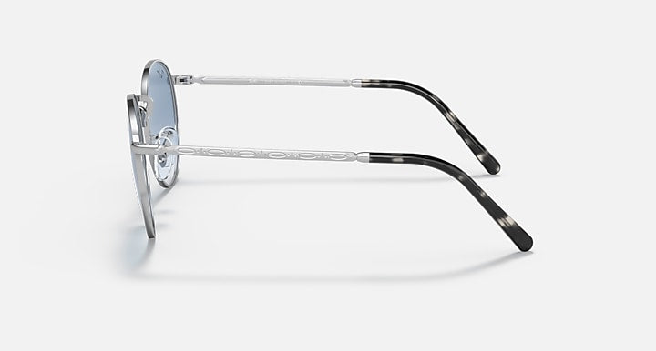 Ray-Ban round sunglasses side view with silver frame and dark tipped arms
