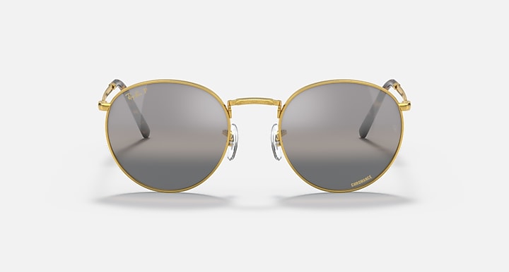 Round gold metal sunglasses, front view, dark gray gradient tinted lenses