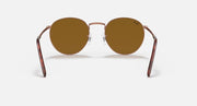 Ray-Ban round sunglasses front view with rose-gold frame and brown lenses