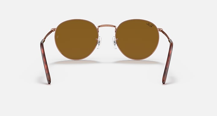 Ray-Ban round sunglasses front view with rose-gold frame and brown lenses