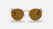 Ray-Ban round sunglasses front view with rose-gold frame and brown gradient lenses