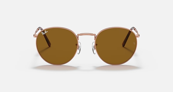 Ray-Ban round sunglasses front view with rose-gold frame and brown gradient lenses