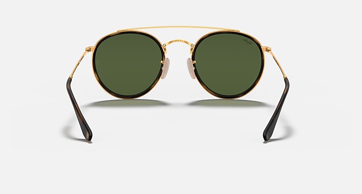 Ray-Ban double-bridge sunglasses with gold frame and dark green lenses