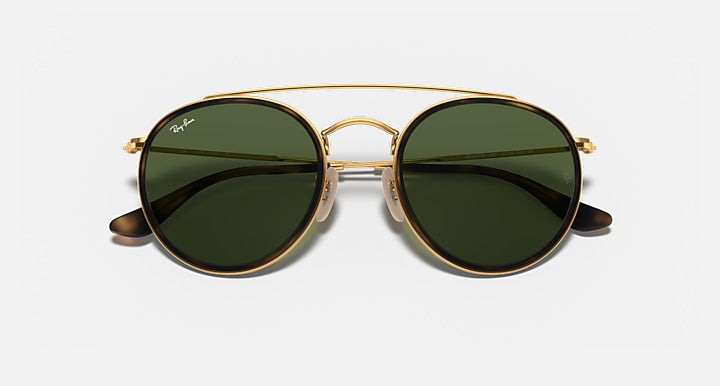 Ray-Ban double-bridge sunglasses, front view with gold frame and dark lenses