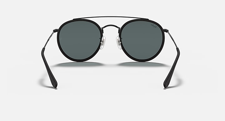 Ray-Ban double-bridge sunglasses with round dark lenses and black arms