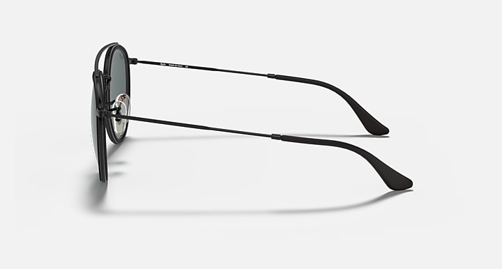 Ray-Ban double-bridge sunglasses, side view of black metal frame and temple