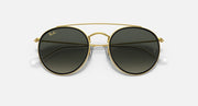 Ray-Ban round sunglasses with gold frame and black-tinted gradient lenses